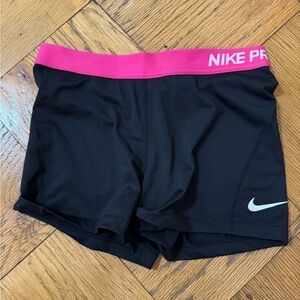 Nike Pro women’s size large dry fit spandex shorts. Gently worn. Pink band